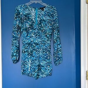 Blue and White Patterned Long Sleeve Romper size small